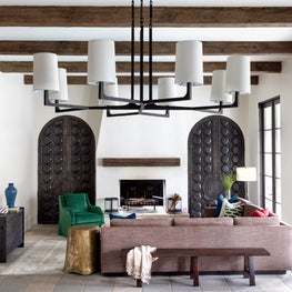 Portfolio: Spanish-style living room with earthy accents and neutral tones