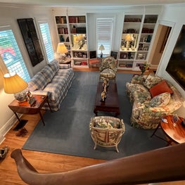 Living room incorporates old and new chinoiserie and plaid