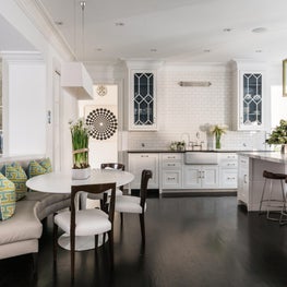 Semi-Circular Banquette Opening to Classic White Kitchen,Espresso Floor & Chairs