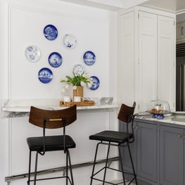 Parisian Inspired Breakfast Bar featuring collected Royal Copenhagen plates with modern patterns in an organic layout