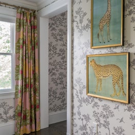 Wallpaper with Floral Print Draperies and Animal Artwork 