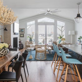 Kitchen and Dining looking into living and outdoor deck 