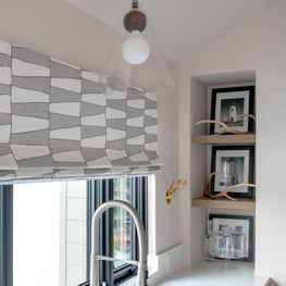 This casement window swings open to let in fresh air while cooking, cleaning and entertaining.