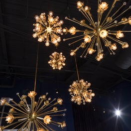 Men's Luxury Clothing Store - Sputnik lighting in cluster of sizes