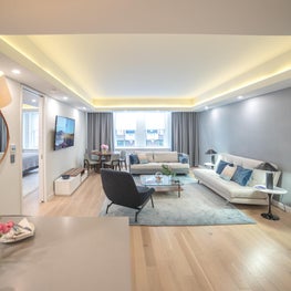 Lombardy Hotel Suites- Ligne Roset sofas, bludot chair, Philipjeffries wallpaper