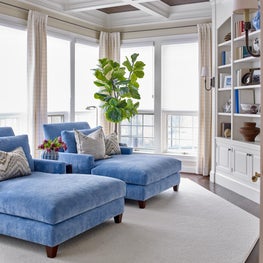 Master Bedroom Lounge with Coffered Ceiling, Built in Bookcases, and a Pair of Chaises