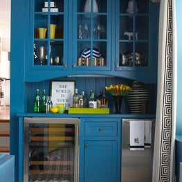 Living Room Bar Area with Blue Cabinetry and Wine Cooler