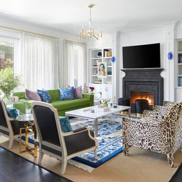 Transitional white living room, black flooring