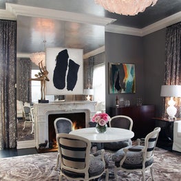 Upper East Side sitting room with textured ceiling, floral rug