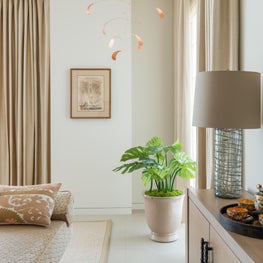 Portfolio: Houston High-rise Living Room, with a neutral palette and worldly interior