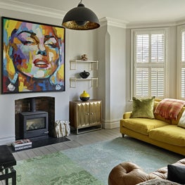 Living room, Muswell Hill, London, with statement artwork