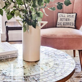 Living Room Vignette with Vintage Table and Needlepoint Pillow