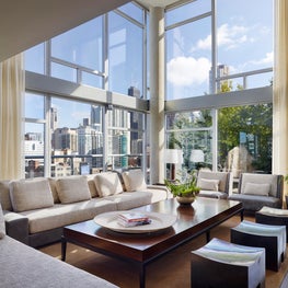 Penthouse Apartment with floor to ceiling windows & custom sheers 