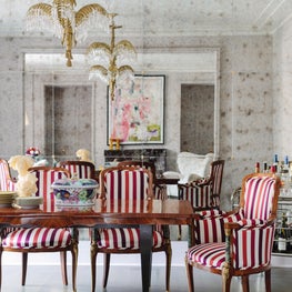 French Dining Room with mid century dining table, art deco chandelier and chairs