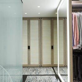Upper West Side Duplex Closet hallway with mirror lighting