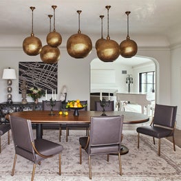 Moroccan lanterns and venetian plaster ceiling dining room.