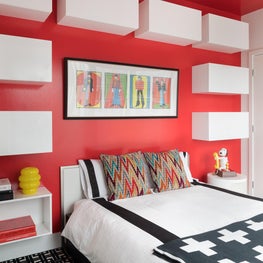 Pop Art inspired Guest Room with wall mounted storage boxes