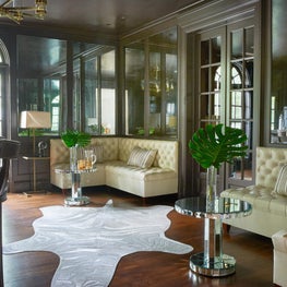 A chocolate-brown bar in a historic Hal Thompson home in Highland Park, Texas.