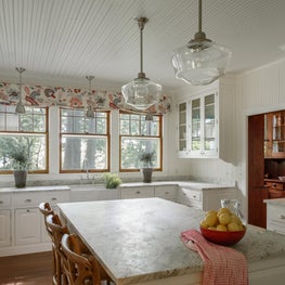 Lake Michigan Cottage: Renovated kitchen & original Butler's Pantry beyond.