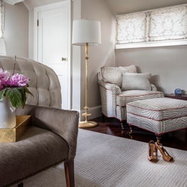 Hide end of bed bench, grey floral modern roman shades in grey bedroom