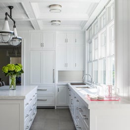 Hamptons Residence, open Kitchen w/ minimal white palette and coffered ceiling