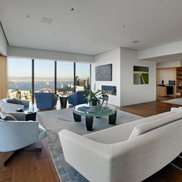 San Francisco, CA - Living Room: cast glass table, Odegard rug, Russian Hill view apartment