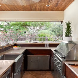 Lake Austin Remodel, Outdoor Kitchen with Ipe cabinetry & stainless farm-sink
