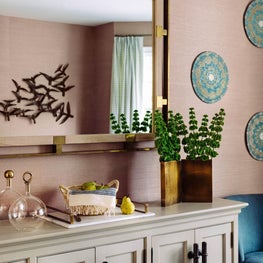 Contemporary dining room with traditional elements  and grasscloth wallpaper