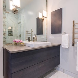 Master Bath with cerused wood cabinets and marble details
