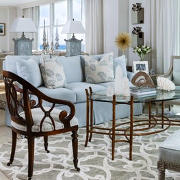 Metallic finishes and wood tones add texture to this monochromatic color scheme.