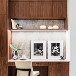Custom designed kitchen workspace in walnut millwork