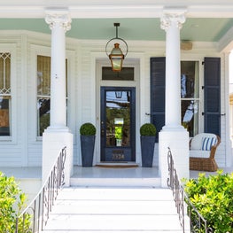 Front Entrance. Exterior Renovation with new paint job and custom outdoor furnishings
