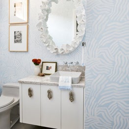 Game Room Bathroom Featuring Blue & White Wallpaper
