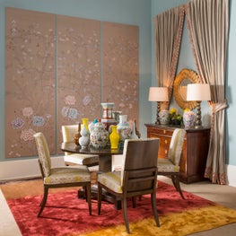 Beautiful hand painted DeGournay panels mixed with yellow dining chairs