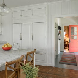 Lake Michigan Cottage: Renovated kitchen with entryway & family room beyond.
