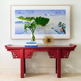 Roy Lichtenstein's, 'Landscape With Boats'  above a red antique asian console.