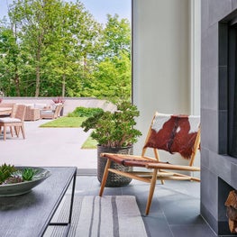 Indoor-Outdoor Living, Three-Seasons Room, Cowhide Chair, Retractable Glass Walls, Perennials Fabrics, Jayson Home Chair - Glencoe Contemporary Project
