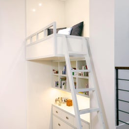 West Village Triplex Kids Bunk Play Area with bookshelves, loft, desk, ladder
