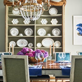 Dining Room Featuring a China Cabinet