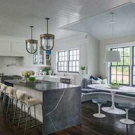 Kitchen and Breakfast Nook with Marble Island and Built-In Bench Seating