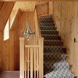 Wisconsin Lake Home with Farmhouse Style: Stairwell Chandelier