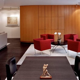 Artful Apartment - Cherry Cabinets & Wall