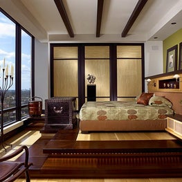 Beamed ceiling enhances this modern bedroom with an Asian flair and spectacular view.