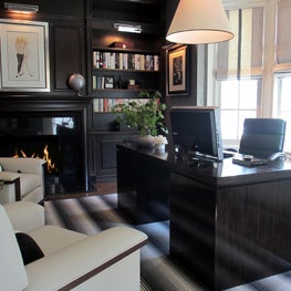 Masculine Home Office with Striped Accents and Cream-and-Black Color Palette