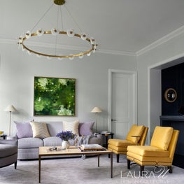 The formal living sits to the left of the entry and connects to the bar for easy flow and effortless entertaining.