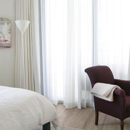 Coconut Grove Miami Guest Bedroom with antique reupholstered side chair