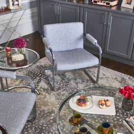 Sitting area detail, modern seating in grey and chrome