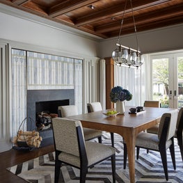 Prairie School art glass and Art Nouveau style merge in a breakfast room. 