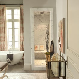 Atlanta Master Bath with vaulted ceiling, custom tile design, and freestanding tub