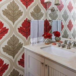 Three Barn Farm Bathroom. Chic farmhouse style with bold large-scale wallpaper & sconce on mirror wall.